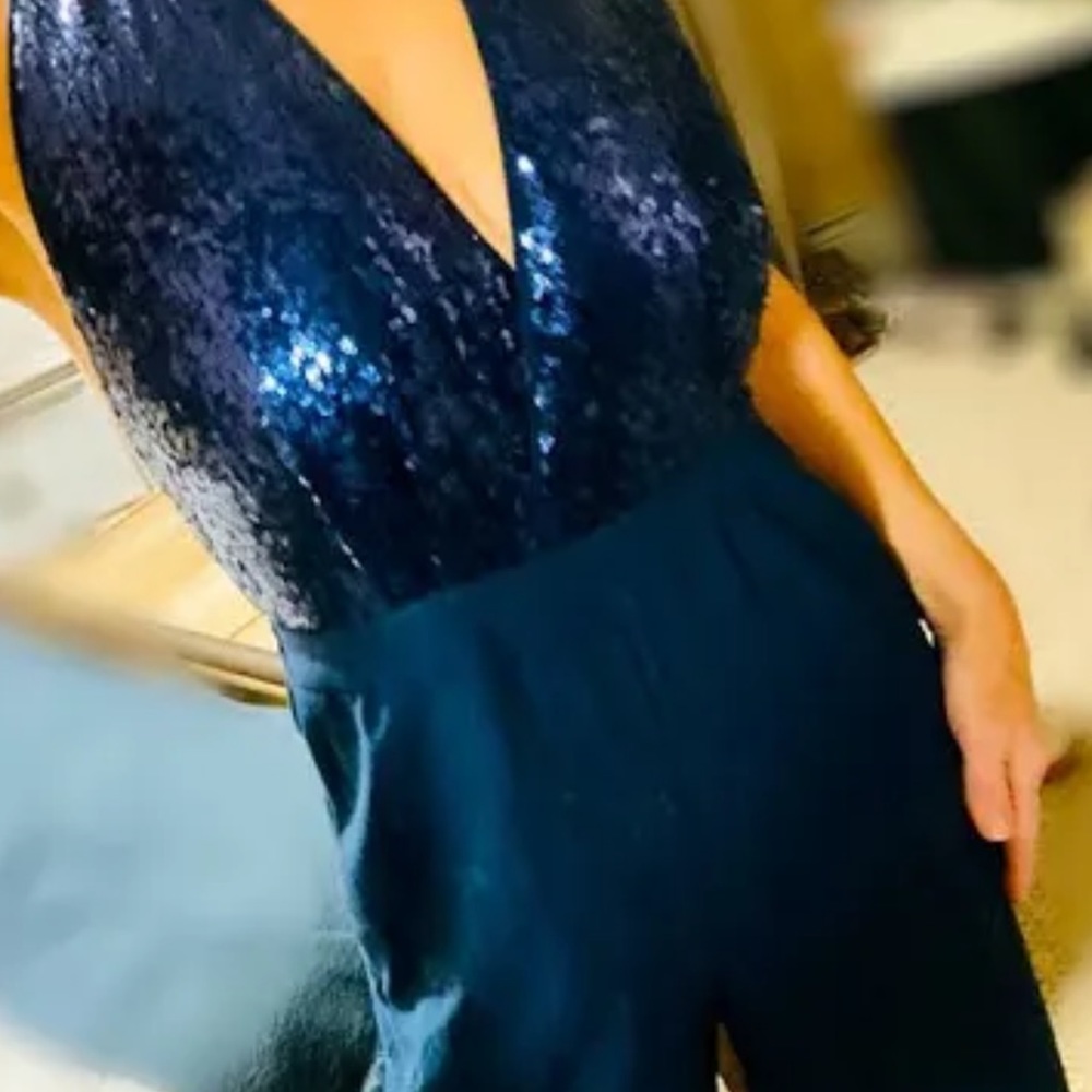 Excellent new condition blue sequins jumpsuit